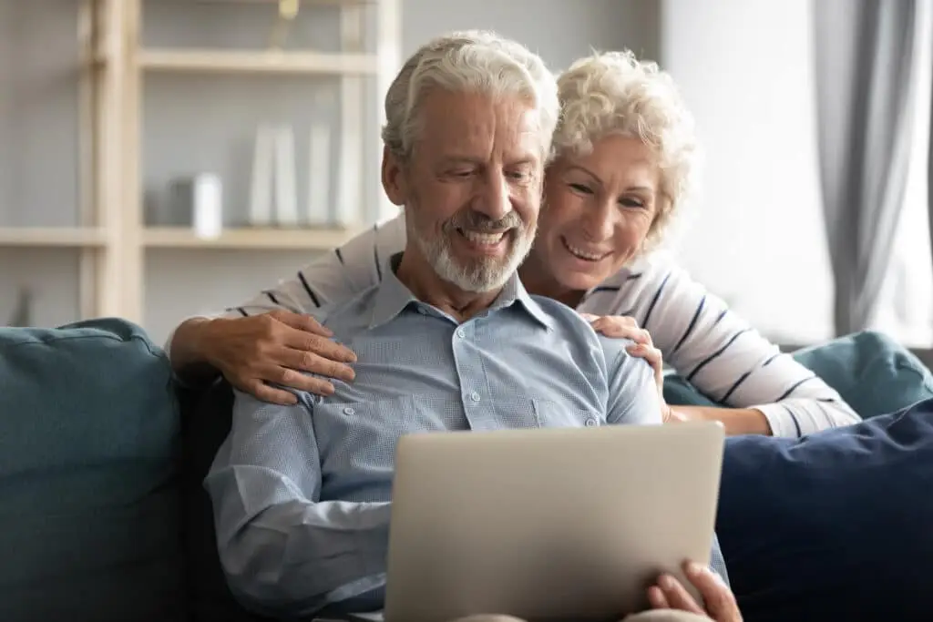 Senior Couple reading Marketing Emails