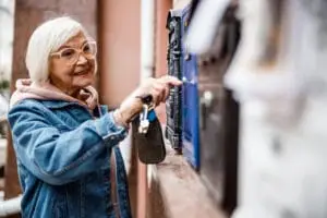 65 year old senior opening the mail